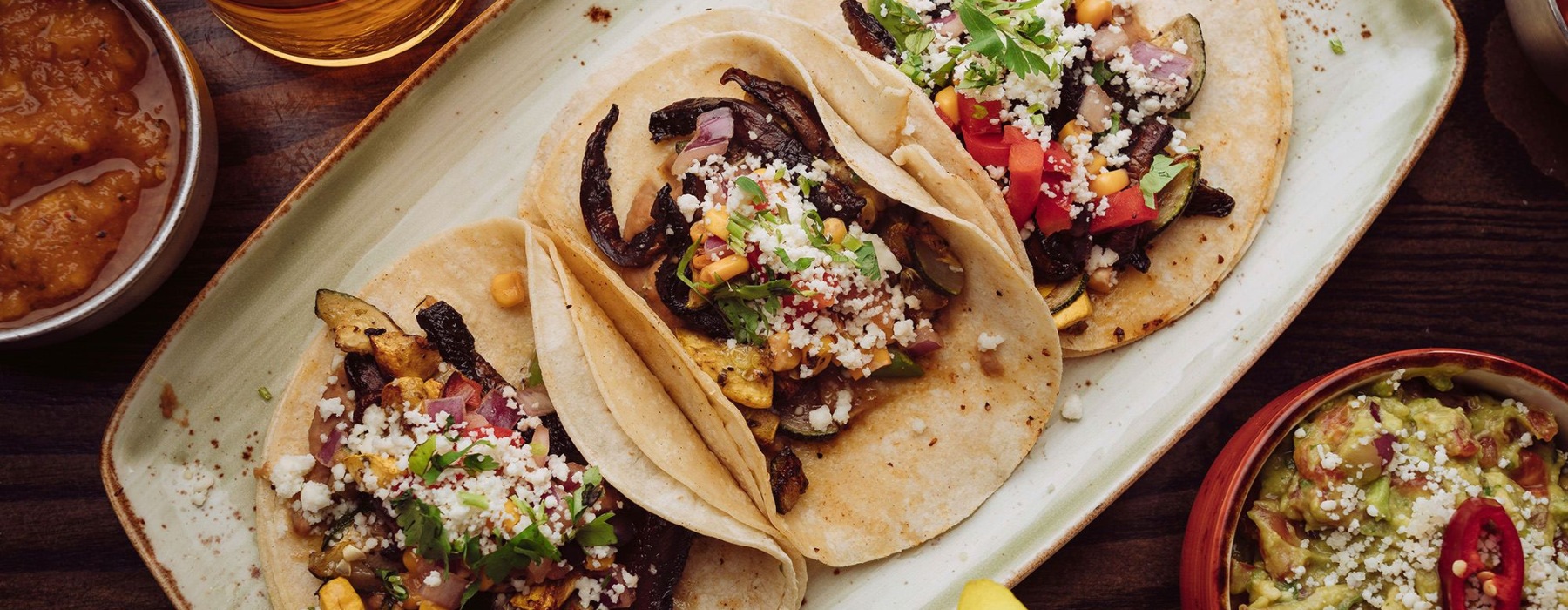 a plate of street tacos