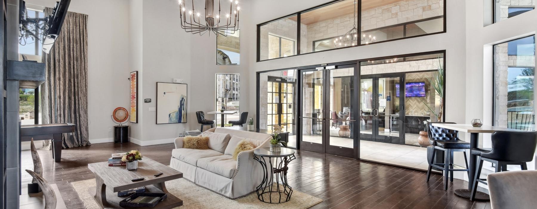 a living room with a large glass wall